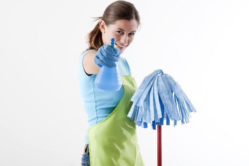 Commercial cleaning team preparing an office space in W14