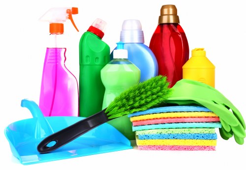 Professional cleaners working in a W14 property interior