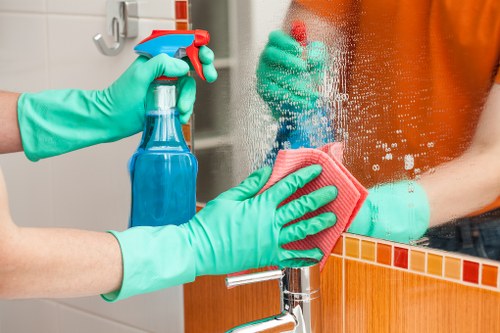 Professional clearance team working in a W14 residential building