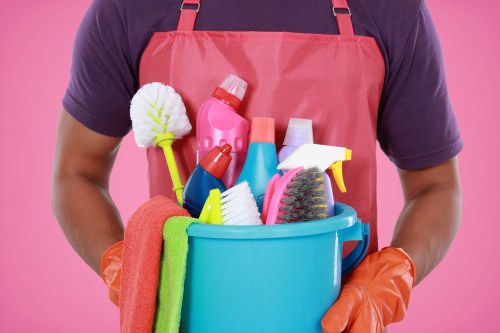 W14 cleaners using protective equipment during a cleaning task