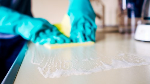 Careful stain treatment on fabric and carpet surfaces in W14 homes